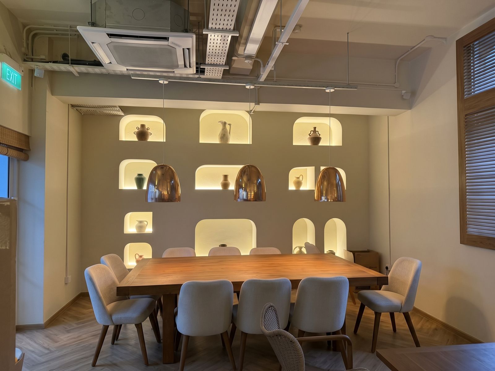 Private dining room at Anemelo Greek restaurant, Maxwell Chambers Suites, Singapore — one of three independent audio zones