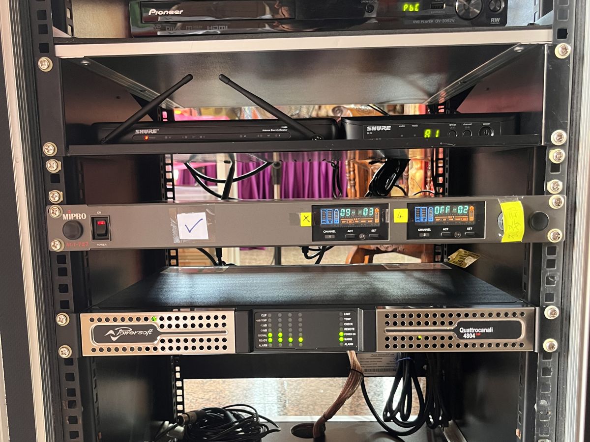 Equipment rack with the Powersoft Quattrocanali 4804 DSP amplifier and wireless receivers at Kuan Im Tng Temple, Singapore